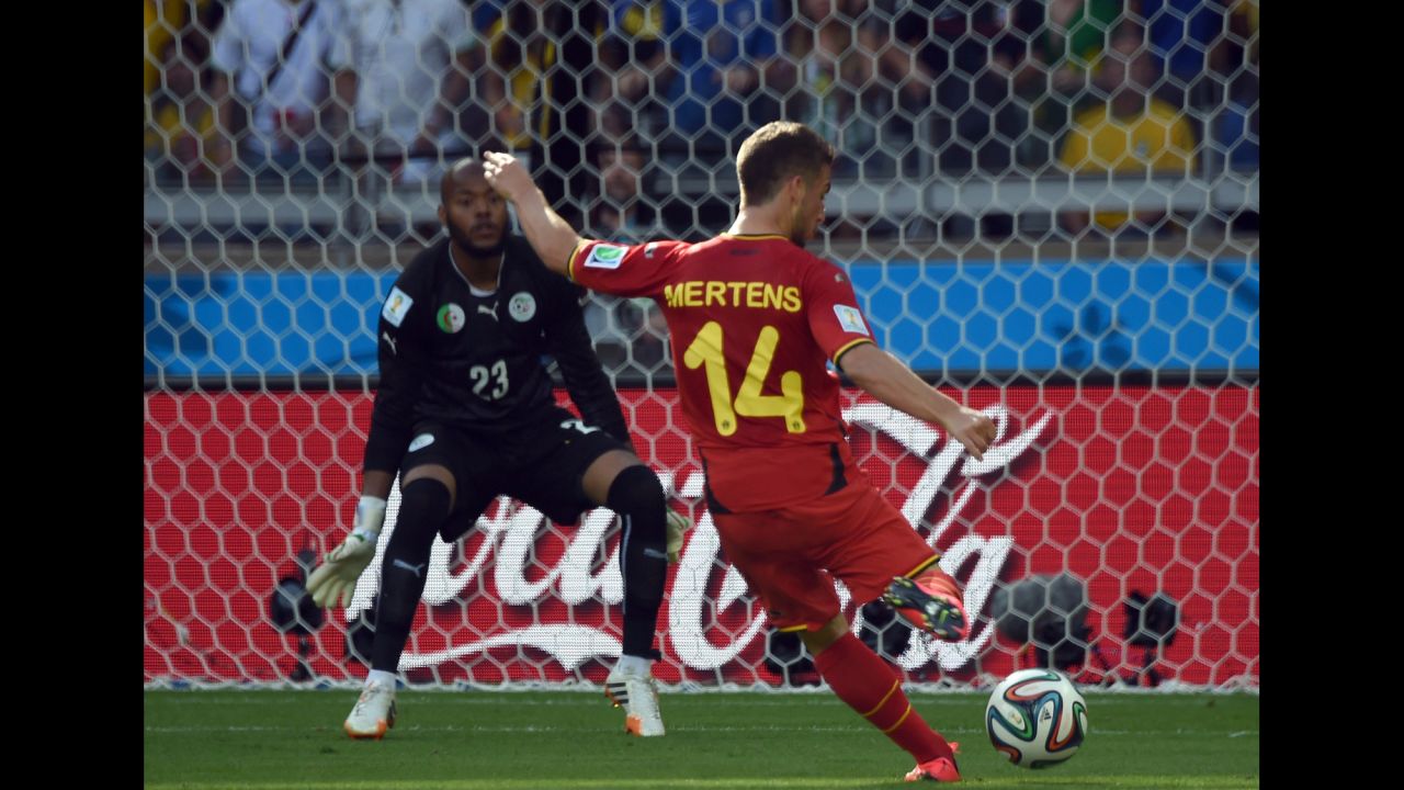Belgium's Dries Mertens shoots what would turn out to be the winning goal during a World Cup match against Algeria on June 17 in Belo Horizonte, Brazil. Belgium won the match 2-1 after trailing 1-0 at halftime.