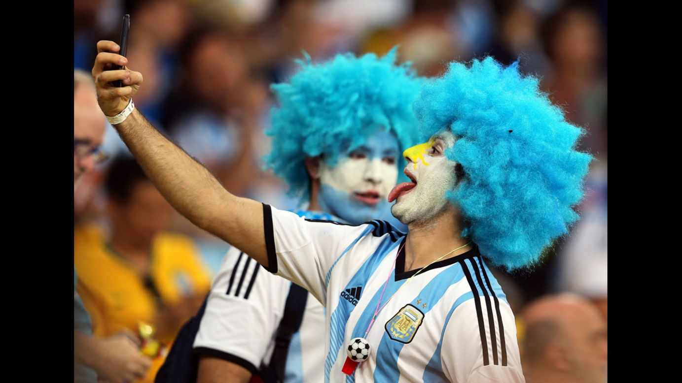 An Argentina supporter takes a selfie before the World Cup match between Argentina and Bosnia-Herzegovina on Sunday, June 15, in Rio de Janeiro. <a href="http://www.cnn.com/2014/06/11/world/gallery/look-at-me-0611/index.html">See 31 selfies from last week</a>