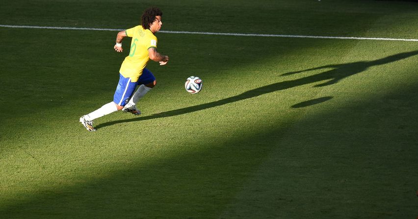 Algunas de las mejores fotos del partido entre Brasil y México que terminó con empate a cero y una excelente actuación del guardameta "Memo" Ochoa.