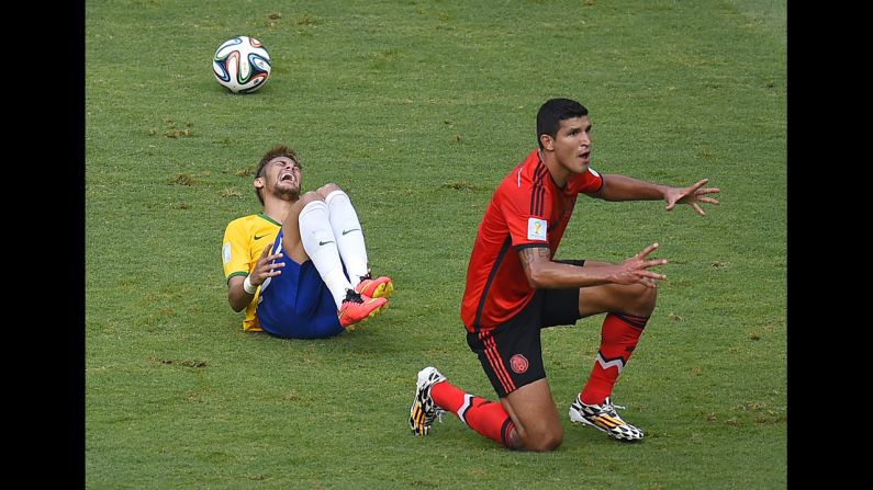 Algunas de las mejores fotos del partido entre Brasil y México que terminó con empate a cero y una excelente actuación del guardameta "Memo" Ochoa.