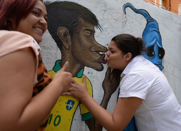 Despite the growing excitement -- no doubt enhanced by Brazil's progression from the group stages to the round of 16 Monday -- Cranio underlines the emotional ambiguity still felt by many in his homeland about the event.<br /><br />"The World Cup is an event that is very beautiful and I like it a lot but Brazil is still a country that has many problems," he said. <br /><br />Here,Brazil's footballer Neymar kisses goodbye the ghost of the 'Maracanazo' (the defeat of Brazil by the winning Uruguayan team in the 1950 World Cup) in a Rio suburb.