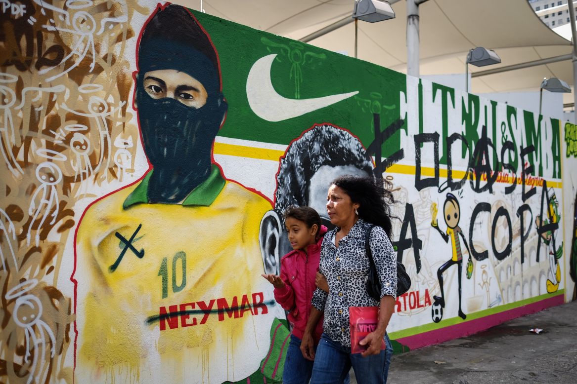 Another image of Neymar which has been co-opted by artists shows the striker in a balaclava. On his shirt, the symbol of one of the side's main sponsors, Nike, has been crossed out.<br /><br />One of the main issues that angered protestors in the run up to the World Cup was the perceived preferential treatment offered to FIFA and their partners (although Nike is not one of these).<br /><br />A large chunk of the cost of hosting the tournament (including the building of stadiums) was also borne by the Brazilian taxpayer.<br />"I think theses events should be held in places where they don't have so many issues," said Cranio. <br /><br />"They are spending a lot of money on the World Cup and are forgetting about the problems that people have already."