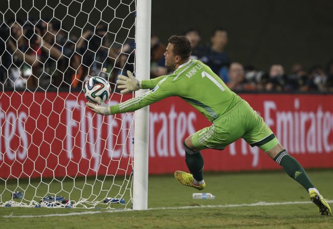 Russian goalkeeper Igor Akinfeev fails to stop South Korea from scoring the first goal of the game late in the second half.