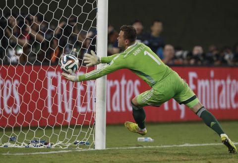 Russian goalkeeper Igor Akinfeev fails to stop South Korea from scoring the first goal of the game late in the second half. 
