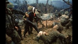 Wounded Marine Gunnery Sgt. Jeremiah Purdie (C) be
Caption:VIET NAM - 1966: Wounded Marine Gunnery Sgt. Jeremiah Purdie (C) being led past stricken comrade after fierce firefight for control of Hill 484 south of the DMZ. (Photo by Larry Burrows/Time Magazine/Time & Life Pictures/Getty Images)