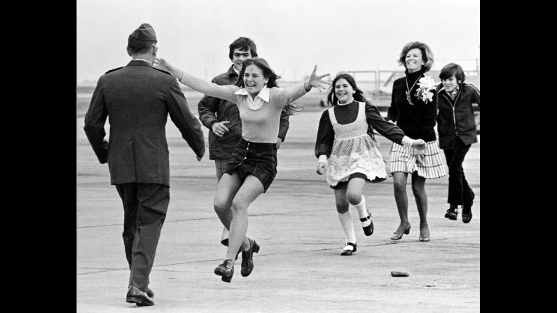 Newly freed U.S. prisoner of war  Air Force Lt. Col. Robert L. Stirm is greeted by his family at Travis Air Force Base in Fairfield, California, in 1973. This Pulitzer Prize-winning photograph, named Burst of Joy, was taken by Associated Press photographer Sal Veder. "You could feel the energy and the raw emotion in the air,"<a href="index.php?page=&url=http%3A%2F%2Fwww.smithsonianmag.com%2Fhistory%2Fcoming-home-106013338%2F%3Fno-ist%3D" target="_blank" target="_blank"> Veder told Smithsonian Magazine in 2005. </a>
