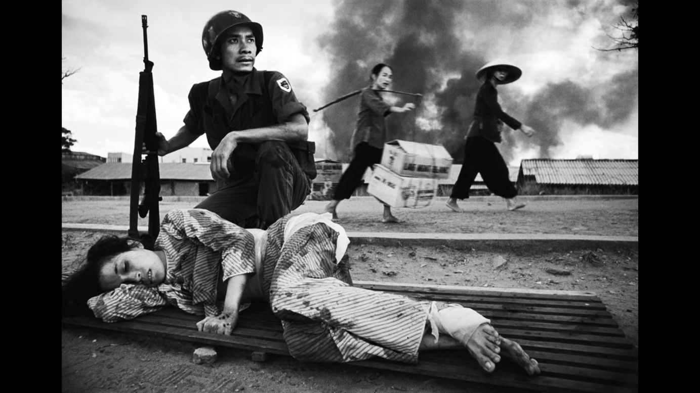 Legendary Welsh war photographer Philip Jones Griffiths captured the battle for Saigon in 1968. U.S. policy in Vietnam was based on the premise that peasants driven into the towns and cities by the carpet-bombing of the countryside would be safe. Furthermore, removed from their traditional value system, they could be prepared for imposition of consumerism. This "restructuring" of society suffered a setback when, in 1968, death rained down on the urban enclaves. In 1971 Griffiths published "Vietnam Inc." and it became one of the most sought after photography books. 