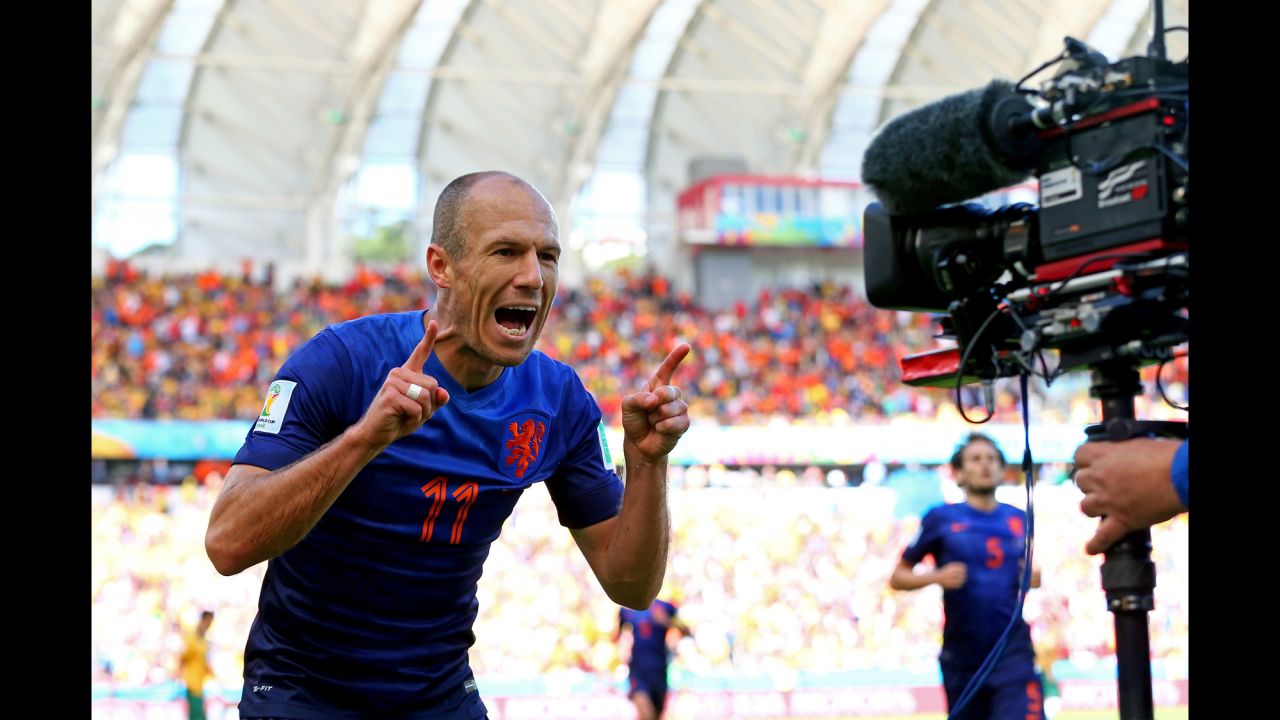 Arjen Robben celebrates after scoring a goal to put the Netherlands up 1-0 in the first half. It was Robben's third goal of the tournament.