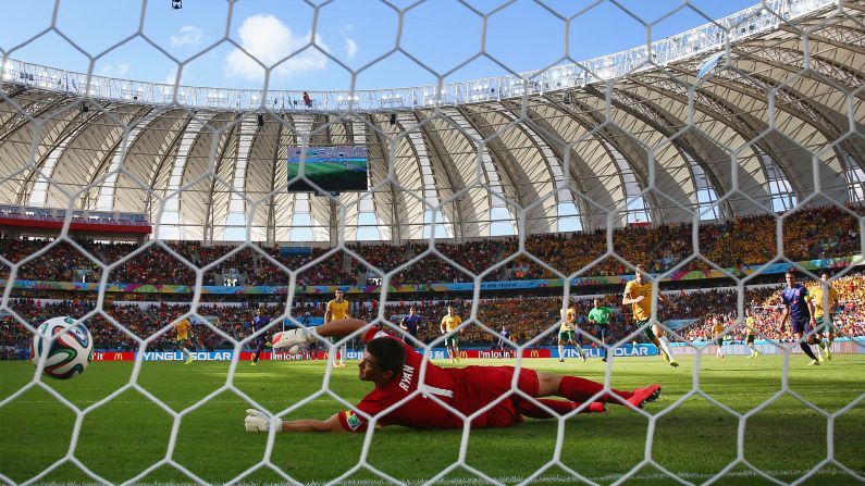 Australian goalkeeper Mathew Ryan can't reach a shot by Memphis Depay on June 18. Depay's second-half goal gave the Netherlands a 3-2 victory in Porto Alegre, Brazil.