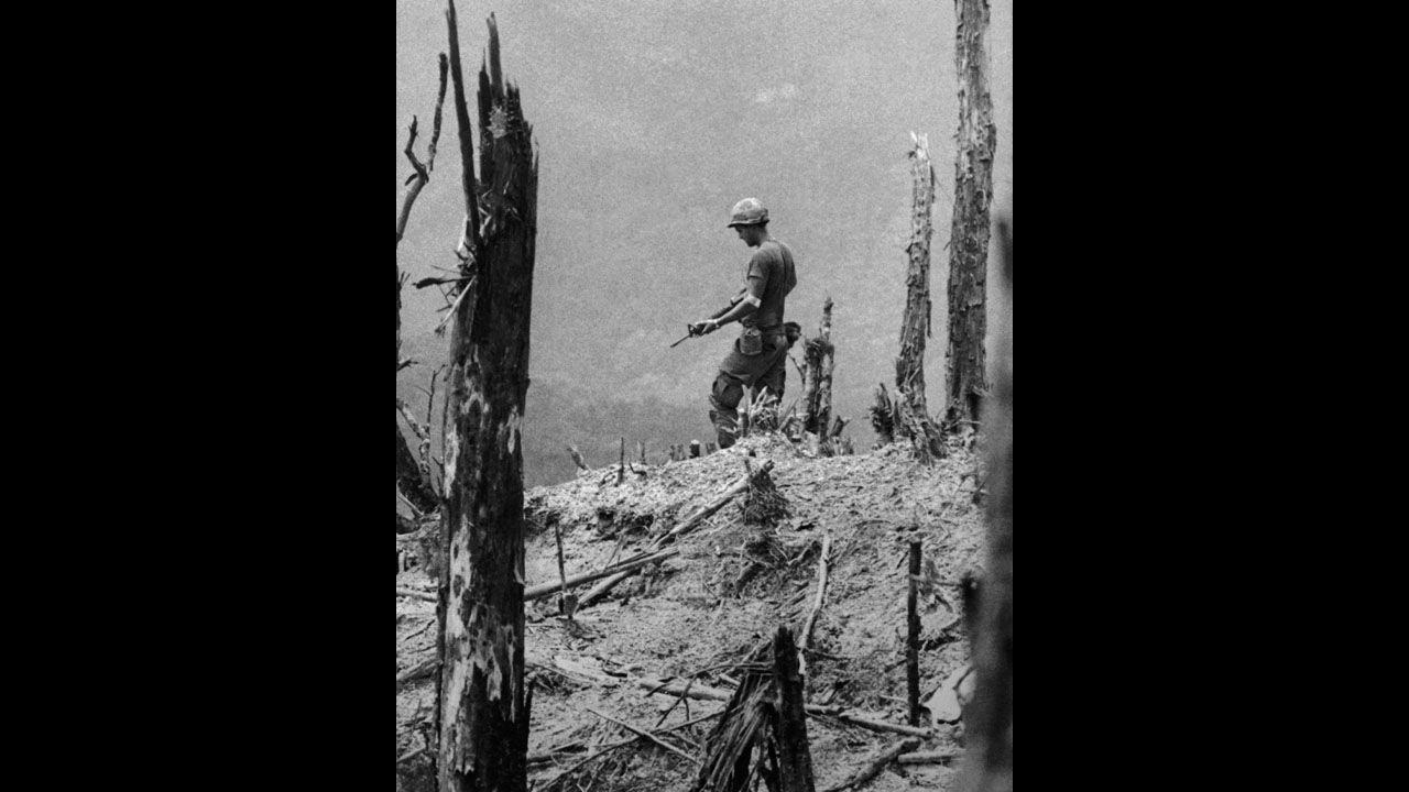 For his dramatic photographs of the Vietnam War, United Press International staff photographer David Hume Kennerly won the 1972 Pulitzer Prize for feature photography. This 1971 photo from Kennerly's award-winning portfolio shows an American GI, his weapon drawn, cautiously moving over a devastated hill near Firebase Gladiator. 