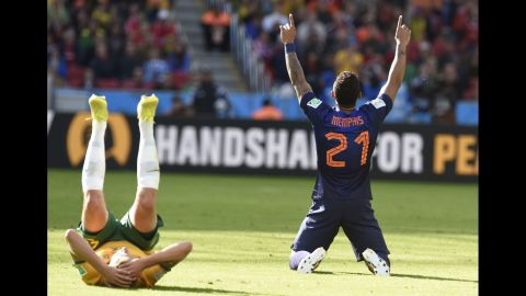 Netherlands forward Memphis Depay celebrates at the end of his team's World Cup match against Australia. Depay's second-half goal was the difference as the Netherlands won 3-2 in Porto Alegre, Brazil.