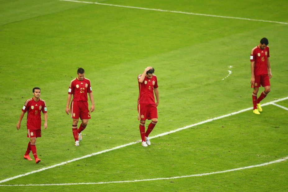 From left, Spanish players Pedro, Cesar Azpilicueta, Javi Martinez and Sergio Ramos react after Chile scored to take a 2-0 lead.