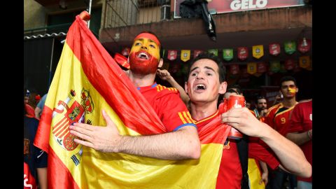 Spain fans cheer at the Maracana before the match.