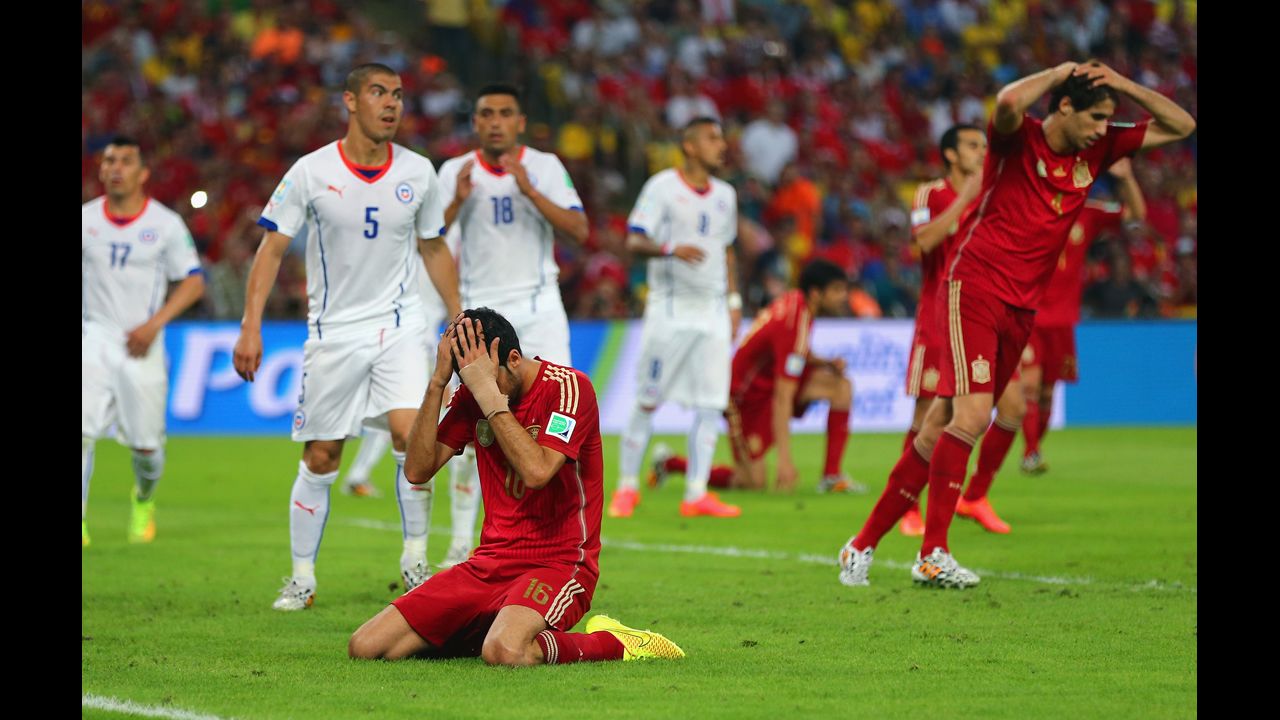Spain's Sergio Busquets reacts after missing a golden chance for a goal in the second half.