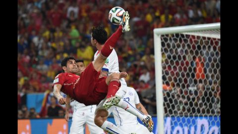 Spanish forward Diego Costa performs an overhead kick.