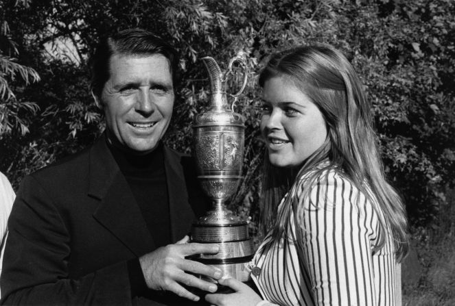 Gary Player holds the 1974 British Open trophy aloft with his then 15-year-old daughter Jennifer after his victory at Royal Lytham.