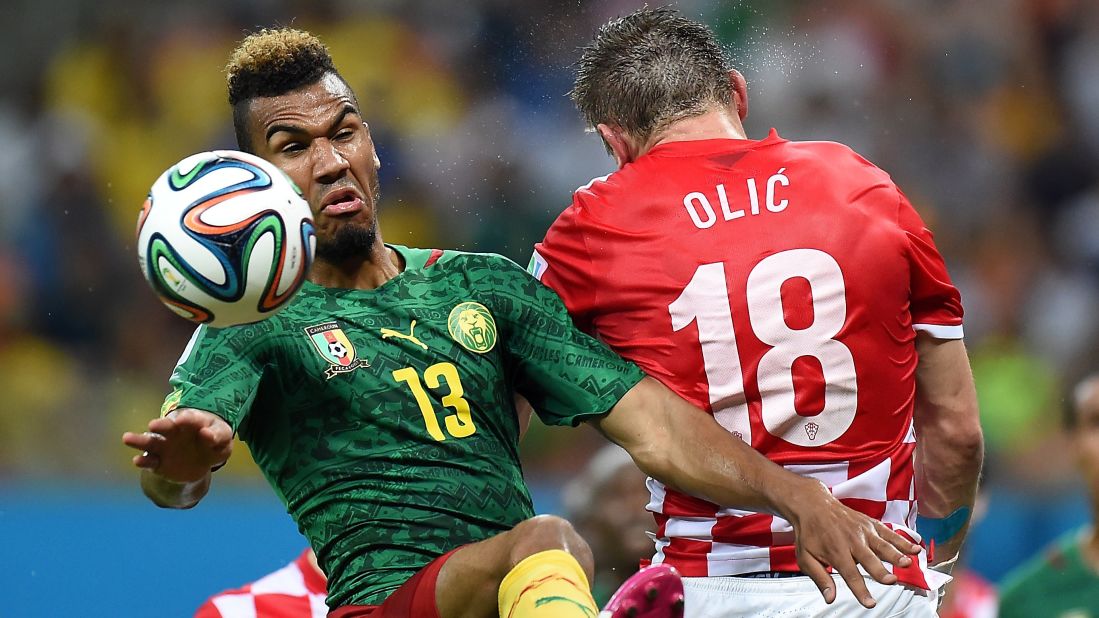 Cameroon's Eric Maxim Choupo-Moting challenges Croatia's Ivica Olic.