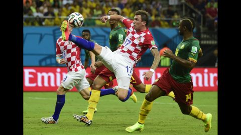 Croatia's Mario Mandzukic vies for the ball.