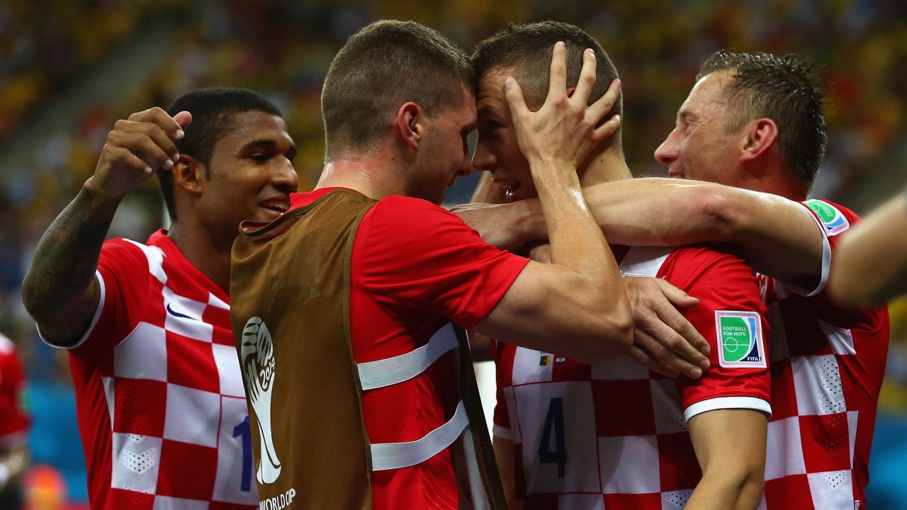 Ivan Perisic of Croatia, second from right, celebrates with teammates after scoring his team's second goal.