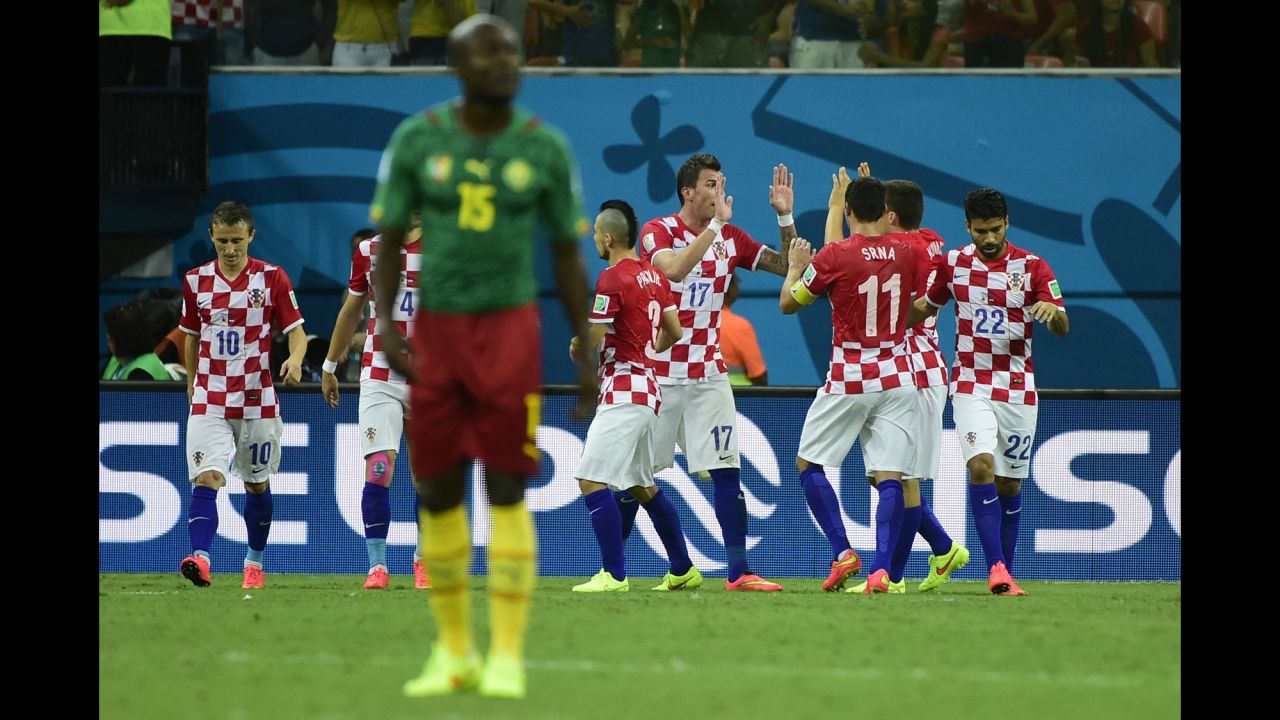 Croatia's team celebrates Mario Mandzukic's second goal.