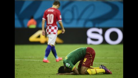 Cameroon's Benjamin Moukandjo, right, reacts during the game.