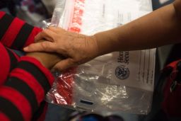 Mothers and children arrive at the station with orders to meet with U.S. officials in a month.