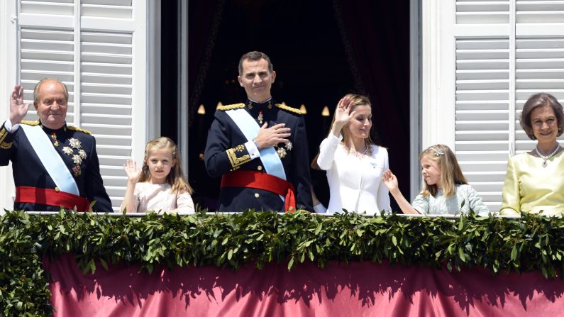 Spain's newly crowned King Felipe VI, third from left, poses with family members on the balcony of the royal palace after a swearing-in ceremony Thursday, June 19, in Madrid. To the far left is his father, Juan Carlos, who abdicated after a 39-year reign. To Felipe's right is his eldest daughter, Leonor. She is 8 years old and now first in line to the throne. To Felipe's left is his wife, Queen Letizia; his daughter Sofia; and his mother, Queen Sofia.
