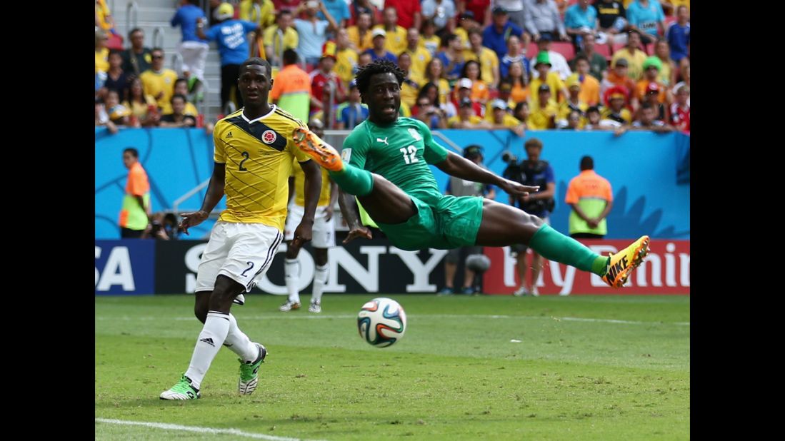 Colombian defender Christian Zapata, left, and Ivory Coast forward Wilfried Bony play in a World Cup match Thursday, June 19, in Brasilia, Brazil. Colombia won the match 2-1.