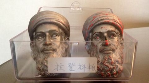 Seen here are two sample heads of the Osama bin Laden action figure doll.
