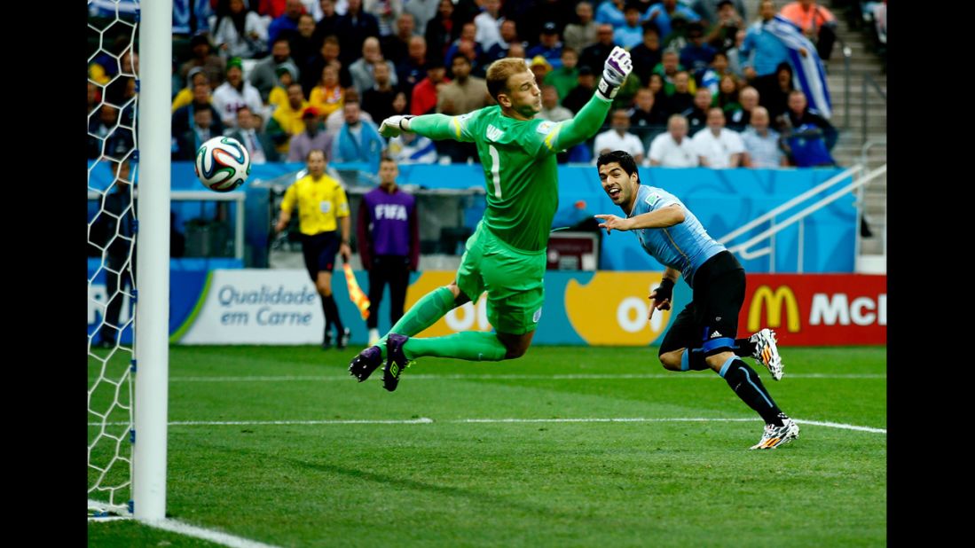 Hart can't stop Suarez's header, which came off an assist from Edinson Cavani.