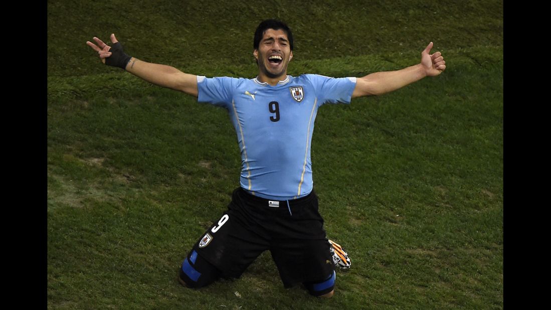Suarez celebrates after scoring Uruguay's second goal and breaking a 1-1 tie. He had both of Uruguay's goals.