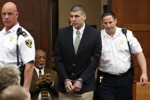 Hernandez is led into a Boston courtroom to be arraigned in May 2014. Evidence collected in Lloyd's death investigation led to two additional murder charges against Hernandez in a separate case in Boston. In that case, Hernandez is accused of shooting Daniel de Abreu and Safiro Furtado, allegedly over a spilled drink at a nightclub. The double shooting took place in July 2012, almost a year before Lloyd was killed. Hernandez, who pleaded not guilty, will be tried in that case after the Lloyd trial.
