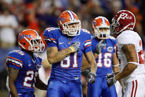 Hernandez, center, reacts during the SEC Championship game between the Florida Gators and the Alabama Crimson Tide on December 6, 2008. Hernandez's Gators went on to win the national title.