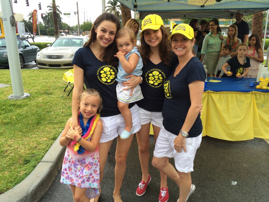 It's a family affair!  Madison's mom, sister and niece lend a hand at an event for Alex's Lemonade Stand in Fort Lauderdale, Florida.