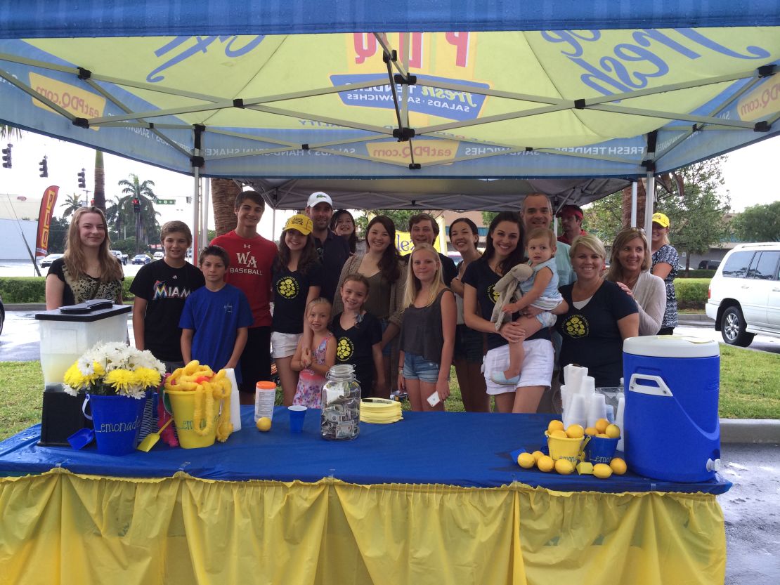 Bailee Madison and friends pose at a lemonade stand at an event in Fort Lauderdale, Florida.