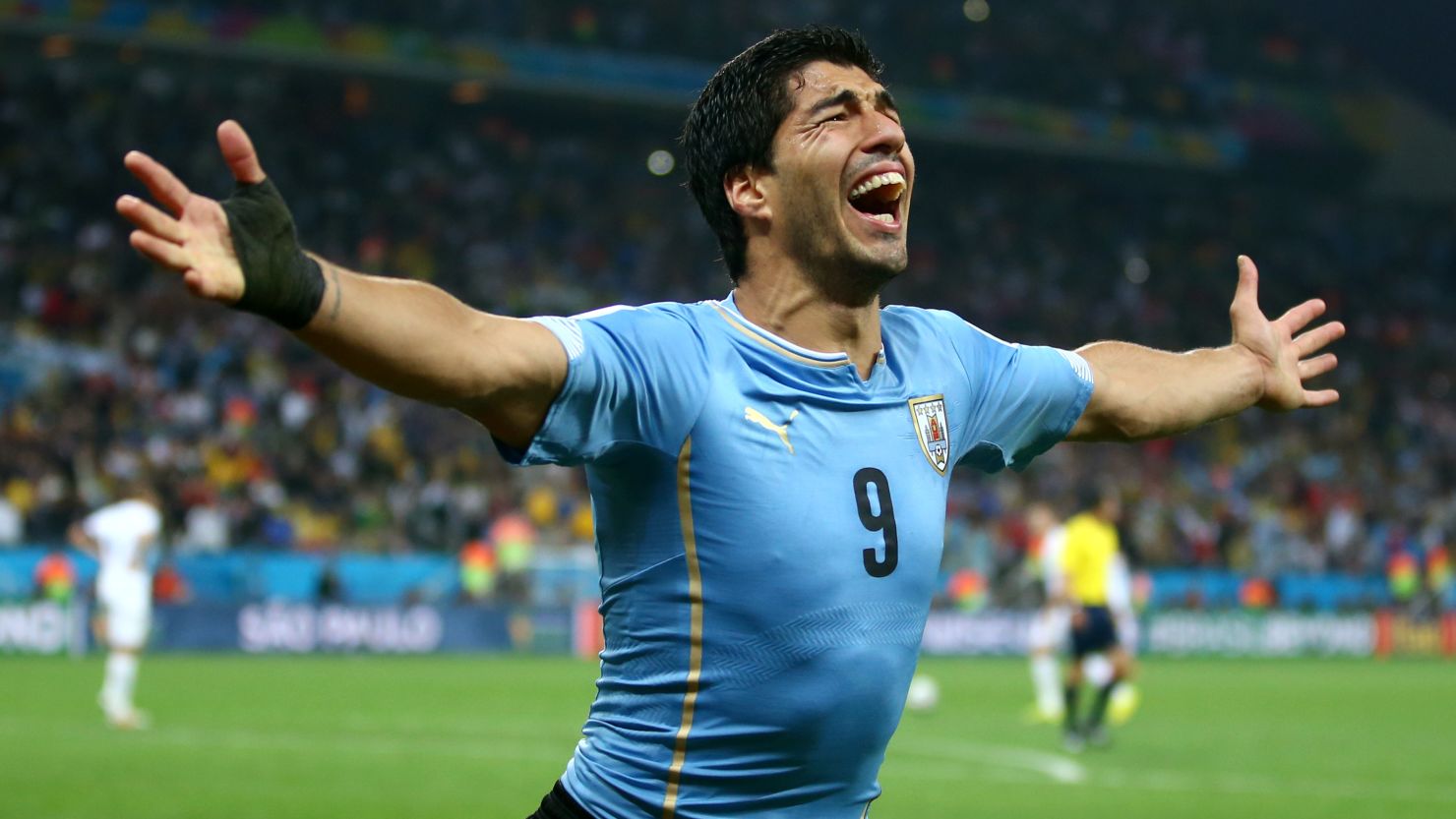 Luis Suarez of Uruguay celebrates after scoring his team's second goal during the 2014 FIFA World Cup Brazil Group D match between Uruguay and England at Arena de Sao Paulo on June 19, 2014 in Sao Paulo, Brazil. 