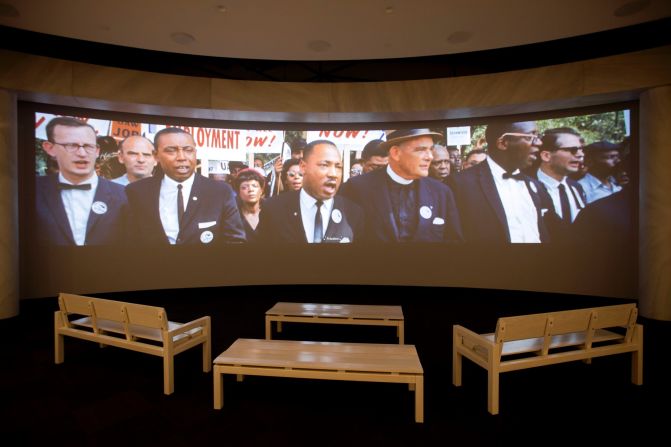 A movie plays as part of the March on Washington exhibit. <a href="index.php?page=&url=http%3A%2F%2Fwww.cnn.com%2F2013%2F08%2F23%2Fus%2Fgallery%2Fcolor-march-on-washington%2Findex.html">See more photos from the 1963 rally</a>, where the Rev. Martin Luther King Jr. delivered his historic "I Have a Dream" speech.