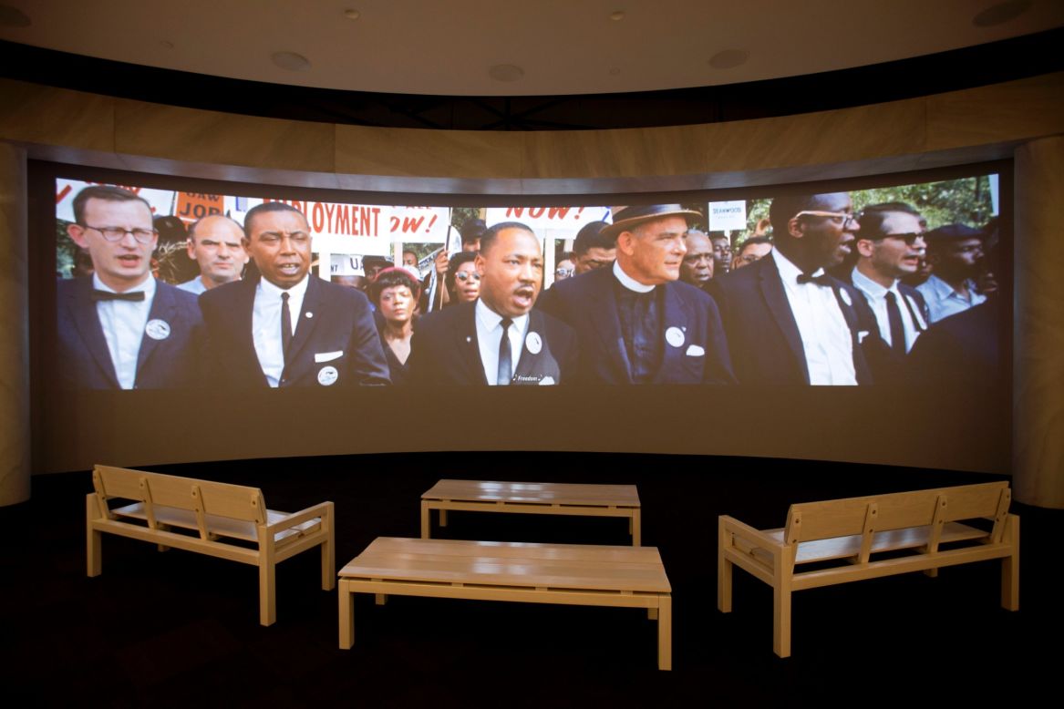 A movie plays as part of the March on Washington exhibit. <a href="http://www.cnn.com/2013/08/23/us/gallery/color-march-on-washington/index.html">See more photos from the 1963 rally</a>, where the Rev. Martin Luther King Jr. delivered his historic "I Have a Dream" speech.