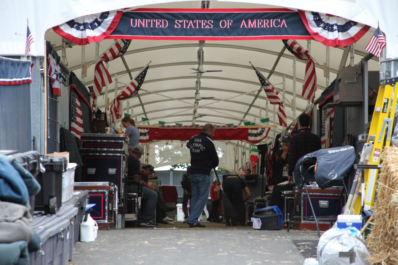 At major events like the Olympic Games, staff work behind the scenes to prepare and treat top horses on behalf of U.S. riders.