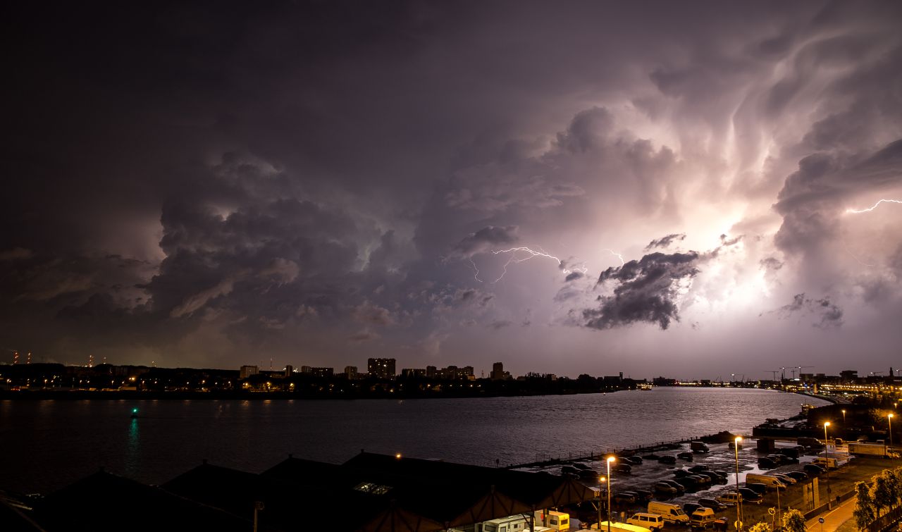 In Antwerp, Belgium, <a href="http://ireport.cnn.com/docs/DOC-1145336">Zachary Koulermos</a> was woken up by a hailstorm in June. After the hail subsided, the rain brought an "amazing lightning storm," he said. He grabbed his camera and tripod as the clouds retreated.