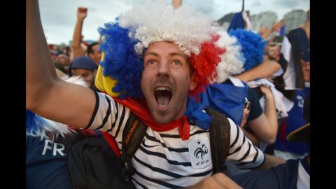 France supporters cheer during the match. 
