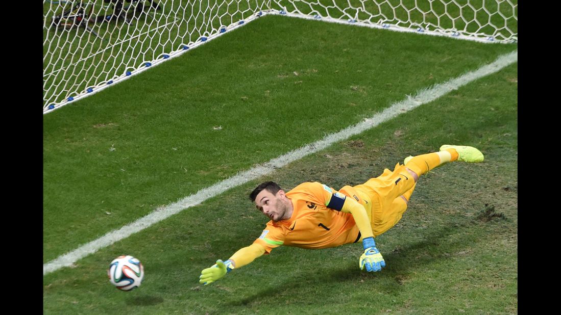 France's goalkeeper, Hugo Lloris, can't reach a free kick from Switzerland's Blerim Dzemaili.