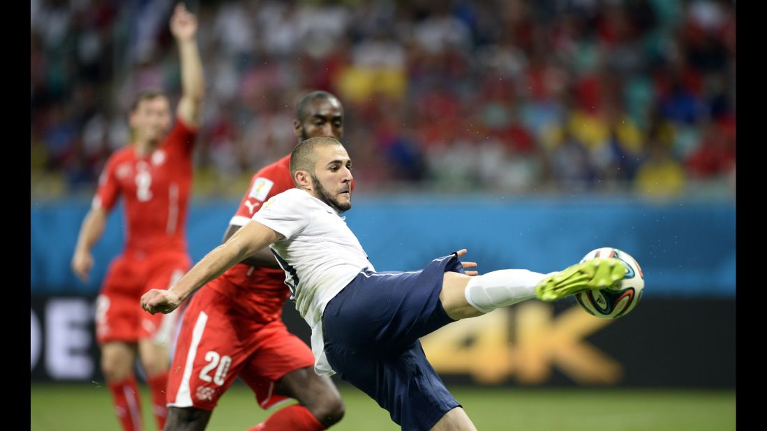 French forward Karim Benzema scores his team's fourth goal.