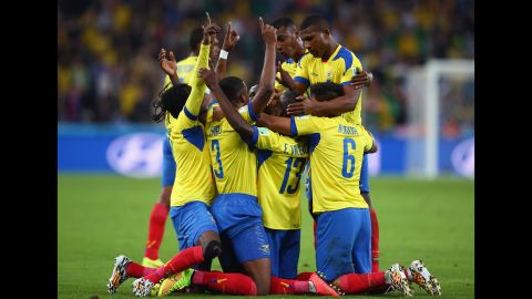 Enner Valencia of Ecuador celebrates with teammates after scoring his team's second goal.