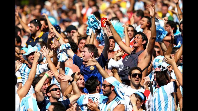 Fans cheer for Argentina. <a href="index.php?page=&url=http%3A%2F%2Fwww.cnn.com%2F2014%2F06%2F20%2Ffootball%2Fgallery%2Fworld-cup-0620%2Findex.html">See the best World Cup photos from June 20.</a>