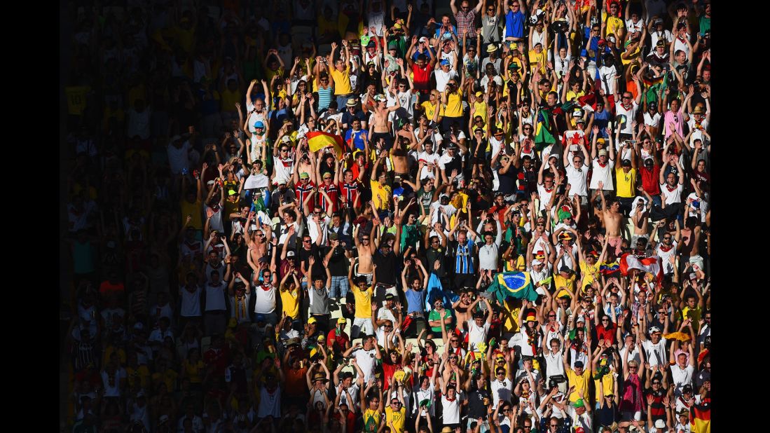 Fans cheer during during the Ghana-Germany match. 