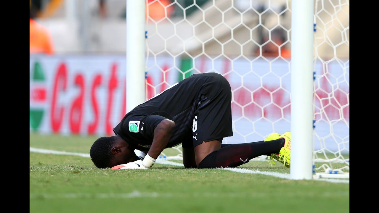 Goalkeeper Fatawu Dauda of Ghana prays prior to the match against Germany in Fortaleza, Brazil. 