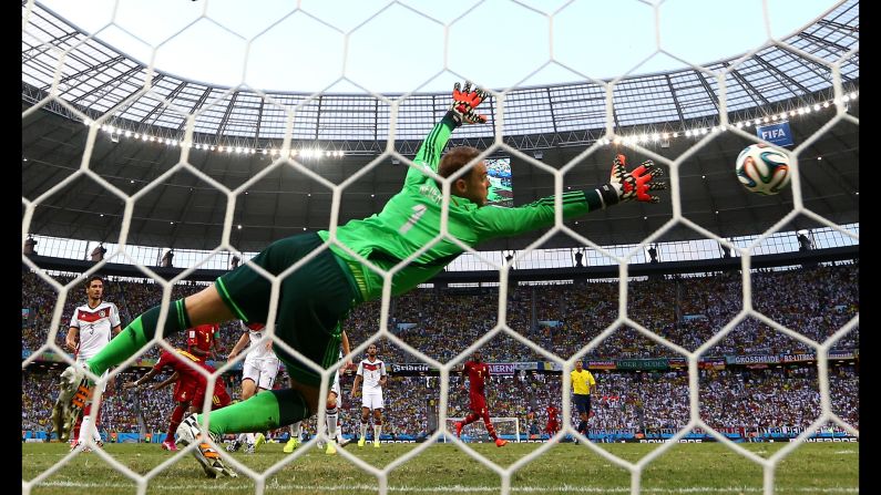 Andre Ayew scores Ghana's equalizer with a header past Germany goalkeeper Manuel Neuer.