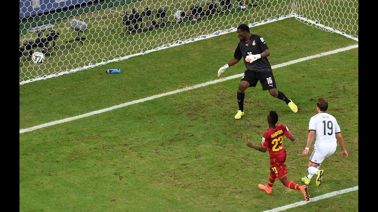 Germany midfielder Mario Gotze, right, scores the team's first goal against Ghana.