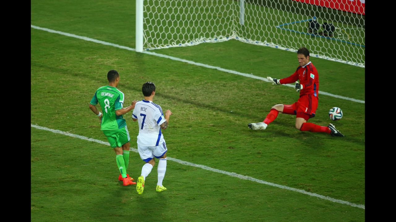 Peter Odemwingie of Nigeria scores his team's first goal past Asmir Begovic.